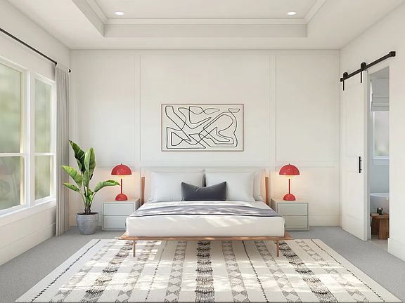 Primary suite with decorative feature wall