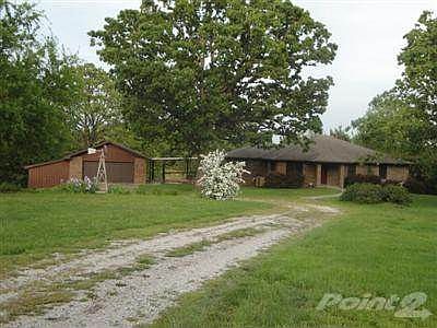 5BR/3BA Brick home with full finished walk-out basement on 20 acres and new 30' x 48' workshop.