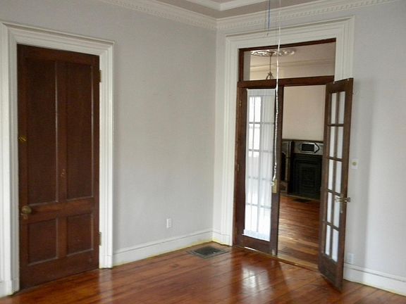 front/4th room with French doors leading to living room
