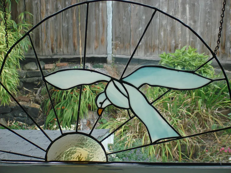 Stained Glass Art Piece
above Staircase