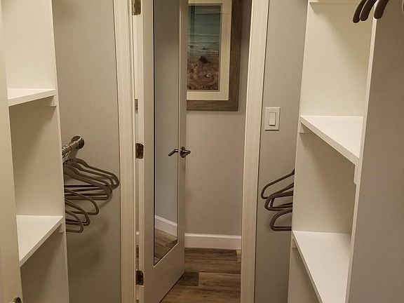 Custom His & Hers Walk in closet, with high fashion Huggabl