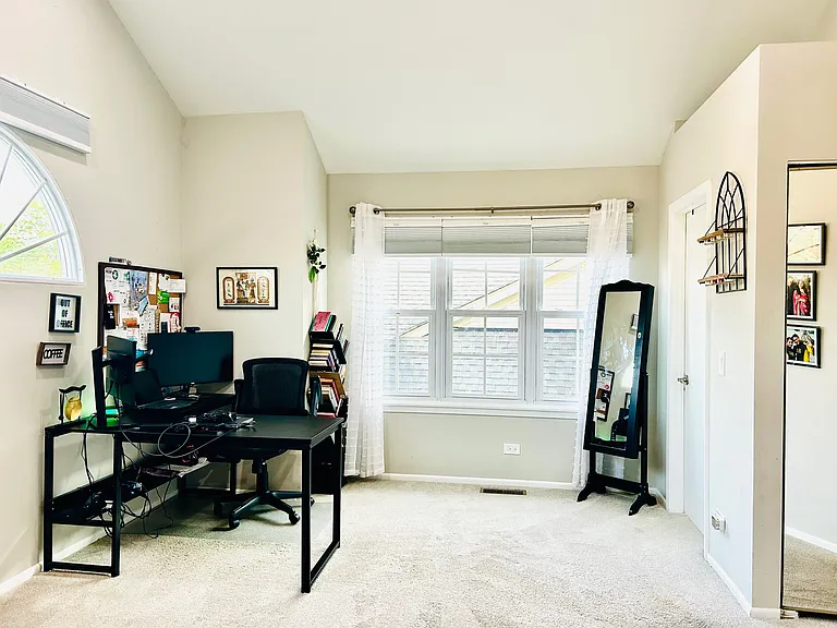 Other end of master bedroom , used as home office
