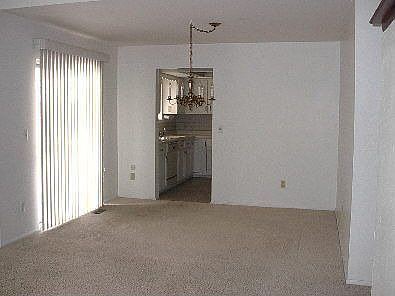 Door leads to sunny covered patio