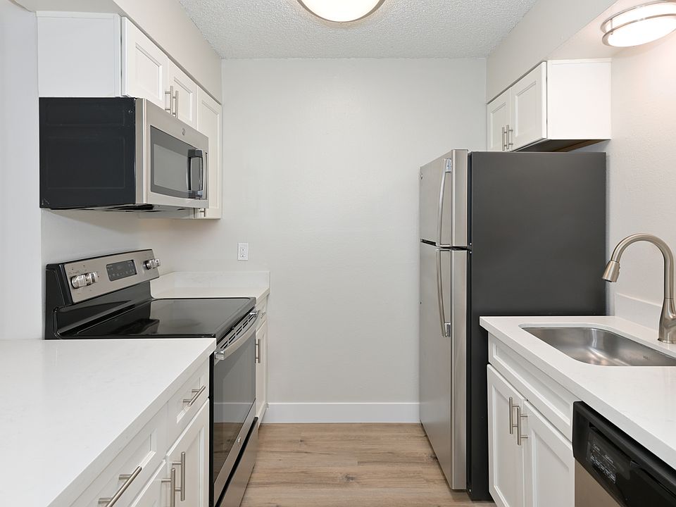 Kitchens features stainless steel appliances and updated cabinetry
