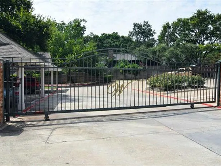 The front entrance gate to the property from Hillcrest Road.