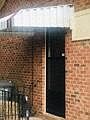 Enter this duplex from the side.