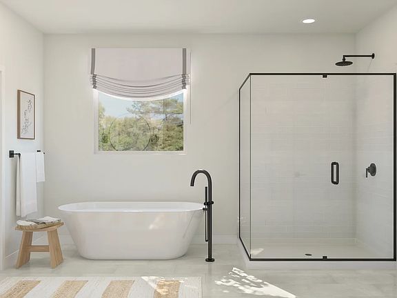 Primary with freestanding vanity and glass shower enclosure