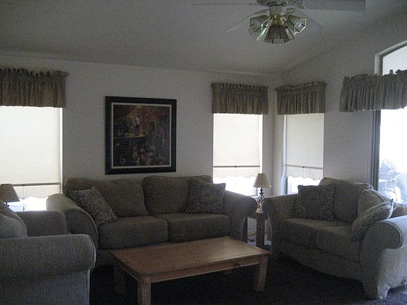 large living room with vaulted ceilings