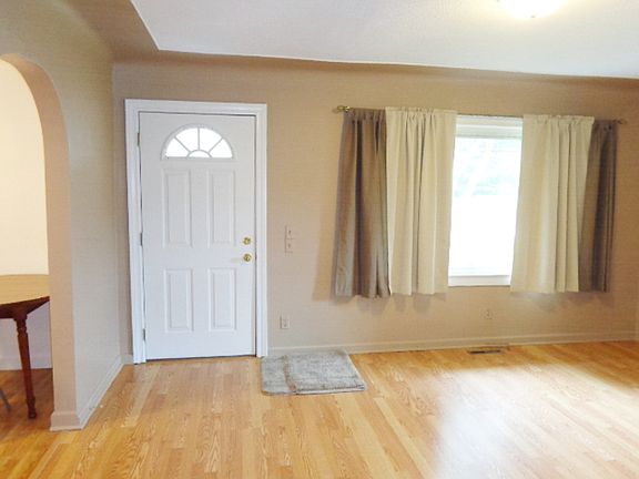 Freshly painted living room. Beautiful laminate flooring.