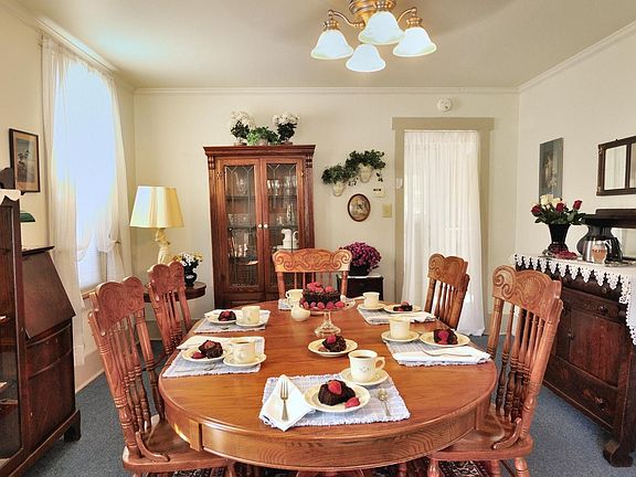 Spacious Dining Room with large table to accommodate family dinners or feasts with friends!