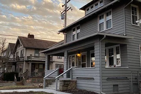 Historic neighborhood that is family-oriented. Each side of the duplex has its own covered porch.
