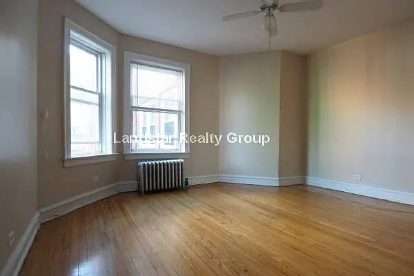 Building Photo - 5028 N Springfield Ave #3W