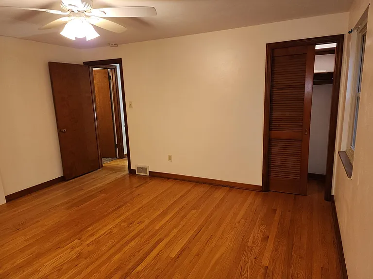 MBR, with 55" closet, pocket door and closet light