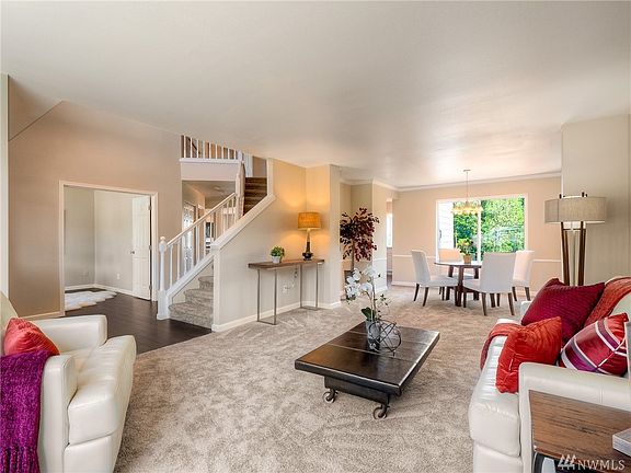 Living room, dinning room, entry and office with double doors. 