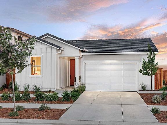 Front Exterior of Plan 3501 with garage at Bridgeway at River Islands