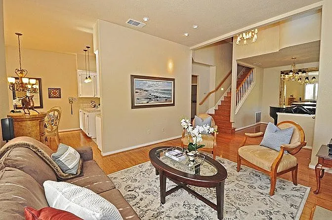 Open floor plan with hardwood floors