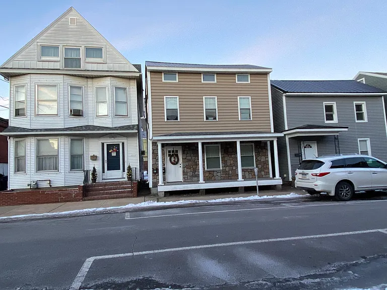 street view, neighborhood. Two doors down from Old City Bagel/Bakery. On the same block as Original Italian Pizza. Mix of residential and small businesses on this block.