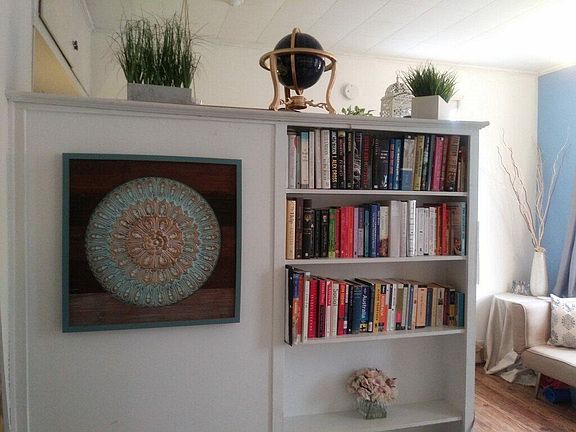 Built in book shelves that divide the efficiency