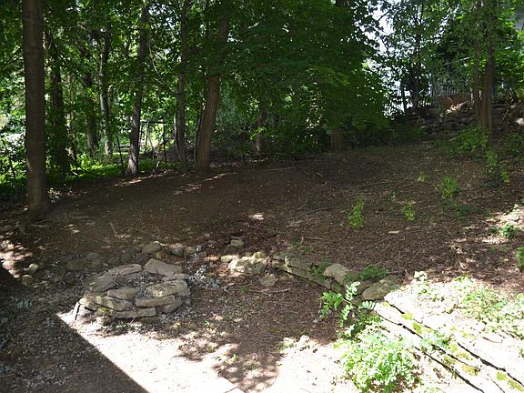 Private back yard with firepit and deck
