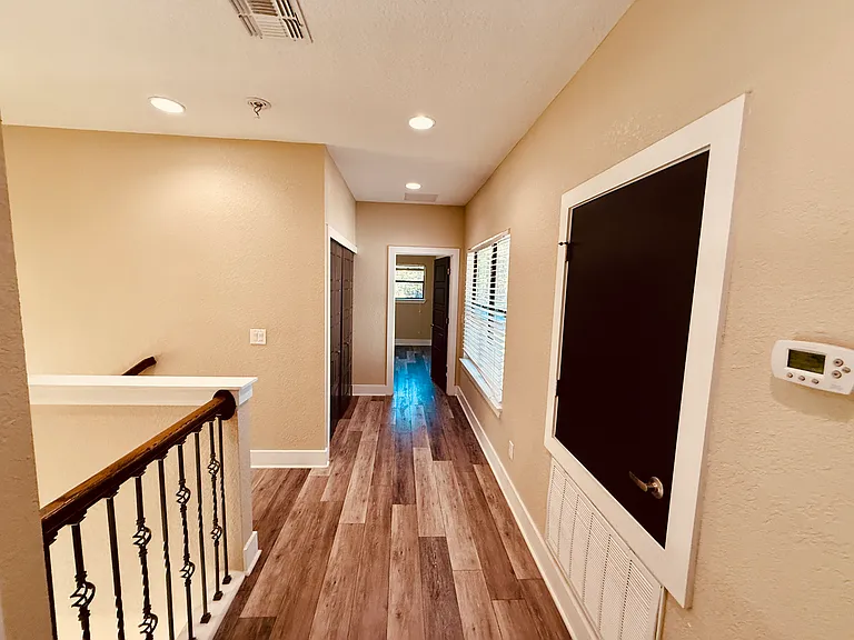Laminate Flooring throughout second floor and Stairs