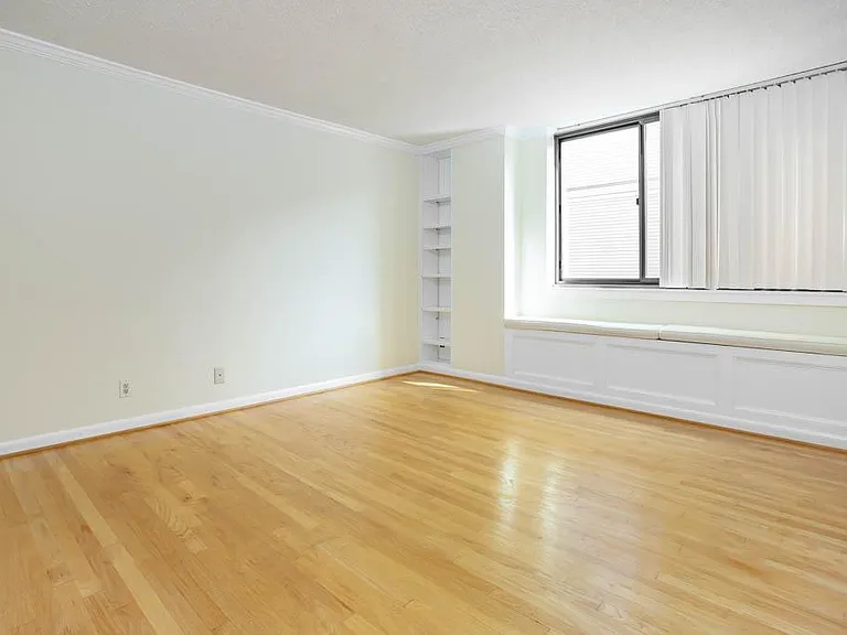 Master Bedroom with built-ins and bay window benches (storage under window benches)