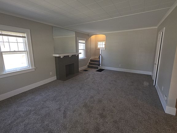 Large living room with new carpeting