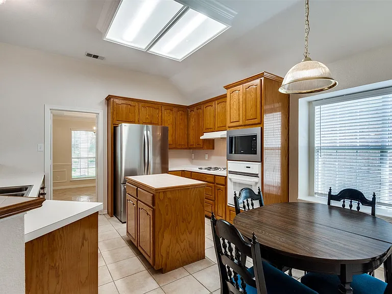 Kitchen with island and breakfast area
