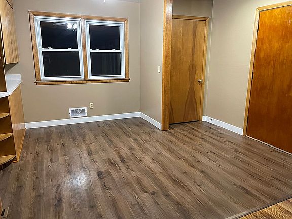 Front door, closet, dining