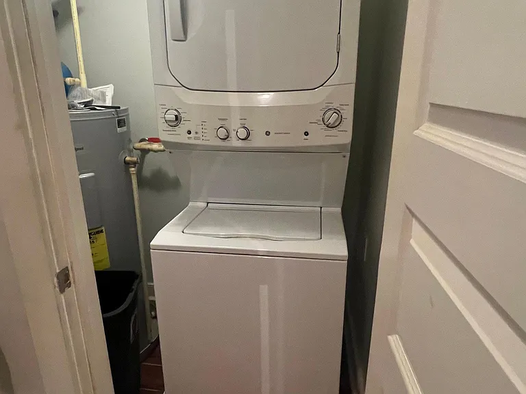 Stackable washer and dryer included.