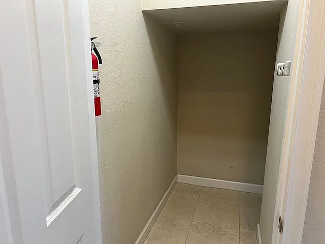 First Floor Closet Under Stairs