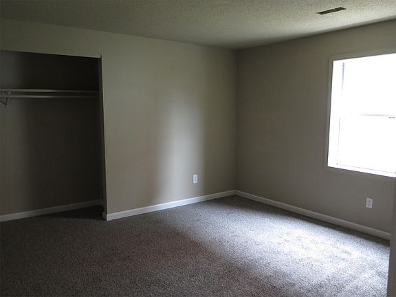 New carpet, new paint job, new trim, new doors in each of the two bedrooms!