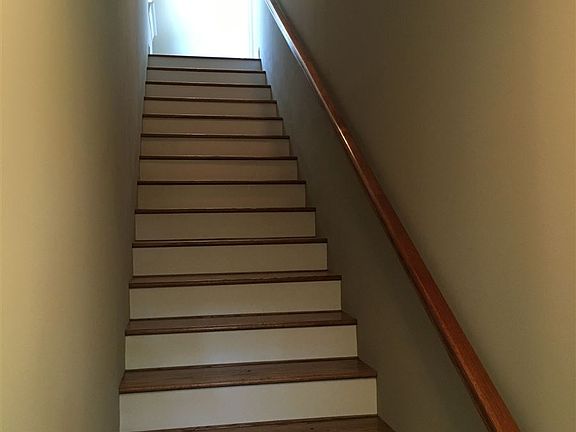enclosed staircase to upstairs