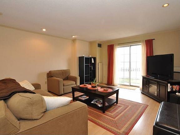 Living w/sliders to Patio