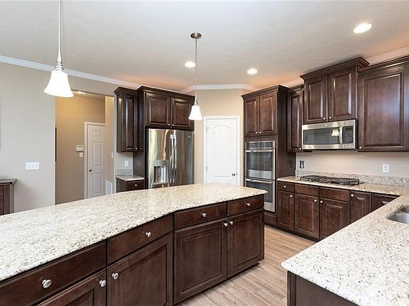 Come right into the mudroom area from the attached garage. Plenty of room for entertaining.