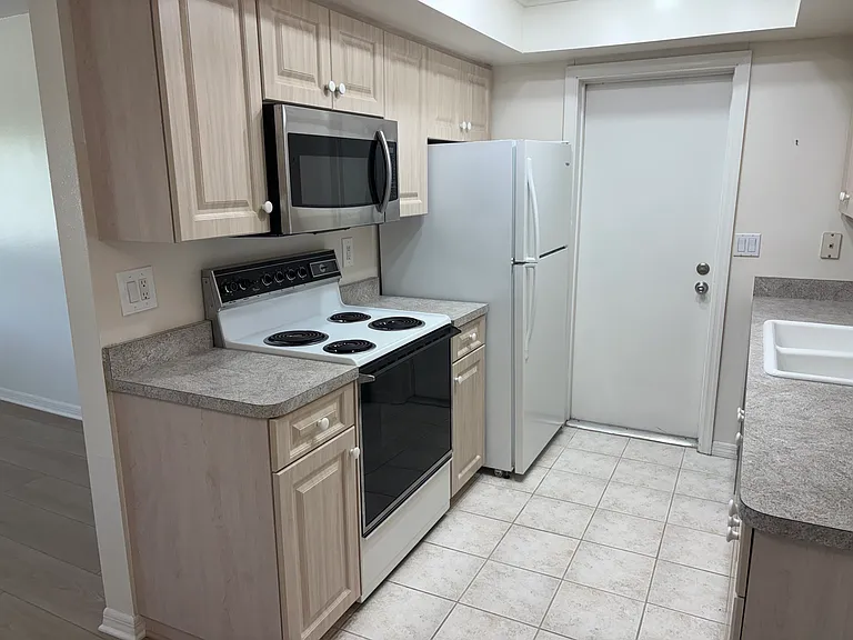 Kitchen with additional entrance.