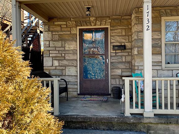 Beautiful entrance including storm door. Personalize you door any color you'd like and imagine yourself walking into this fabulous home.