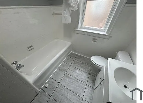 7736 S Colfax Ave — Photo 5