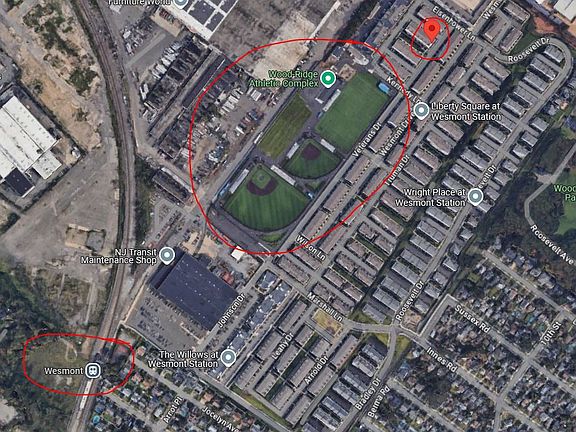 train station (wesmont) within walking distance and athletic complex with fields, playgrounds, and basketball.