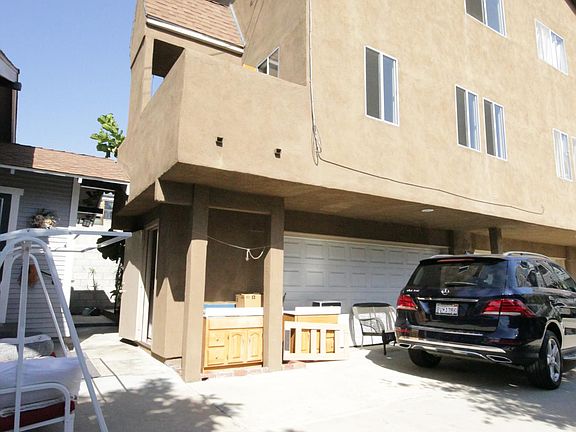 Spacious top floor corner townhouse with a one car enclosed garage!