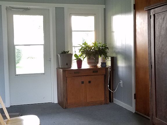 Breezeway with door to patio