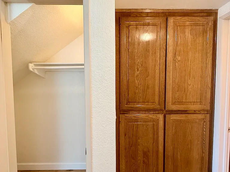 Lower level storage - coat closet & cabinets