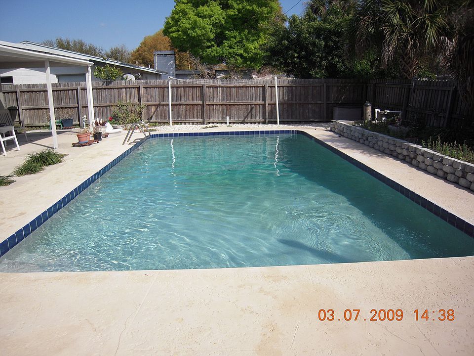 remodeled pool with pebble finish