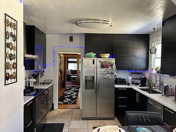 Kitchen facing dining room and living room