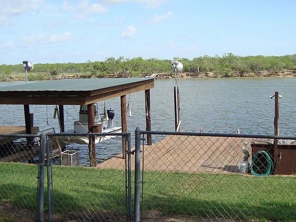 Waterfront Amenities - Covered Boat Lift, Fishing Dock, Cleaning Station, Good Seawall