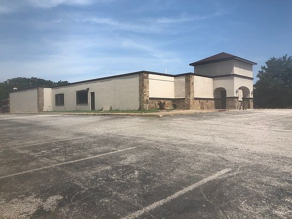 Parking lot and left side 