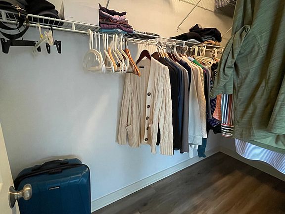 Walk-in closet in the primary