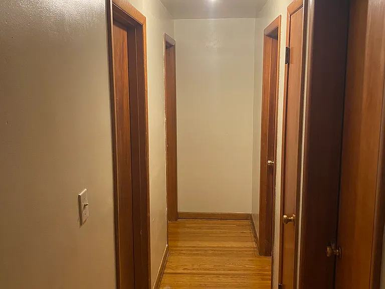 Hallway leading to 3 bedrooms and Main Bathroom - New Light Fixture