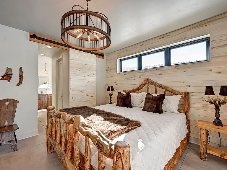 The Lazy Bear Suite has patio access as well as hot tub access outside the sliding door. Oh, and the view is a showstopper!