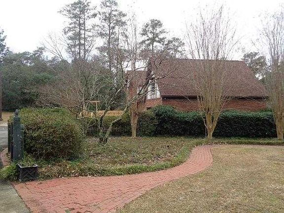 brick paved sidewalk from back driveway to front o