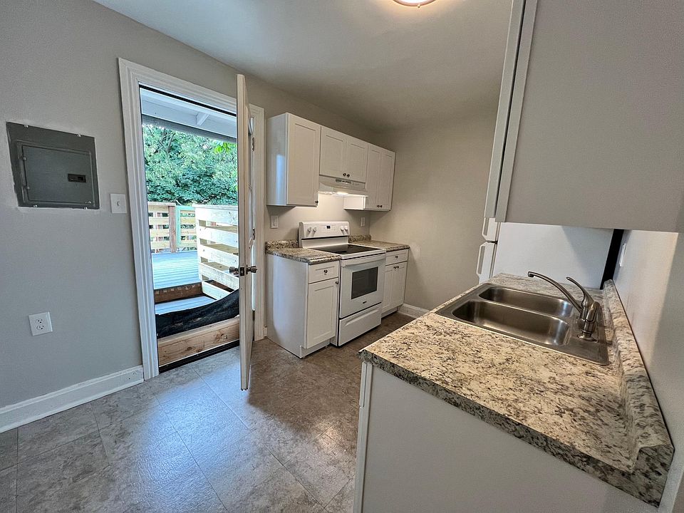 New kitchen with access to rooftop deck